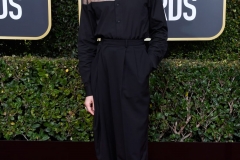 American Horror Story star Cody Fern, flashed some skin through his shirt's daring sheer panels alongside unusual, hoof-like footwear by Maison Margiela.