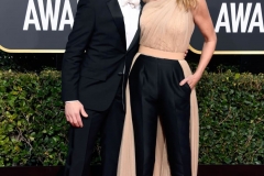 Bohemian Rhapsody star Rami Malek opted for a white bowtie with an otherwise traditional tuxedo. Homecoming star Julia Roberts wore a one-shoulder, glittering Stella McCartney pantsuit