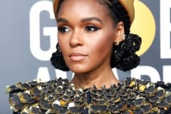 Janelle Monae wore an elaborate golden collar and pillbox hat from Chanel's recent Egypt-inspired Metiers d'Art collection