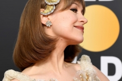 Musician Joanna Newsom, who attended with awards' co-host and husband Andy Samberg, accessorized her Rodarte oufit with a striking hair clip and earrings